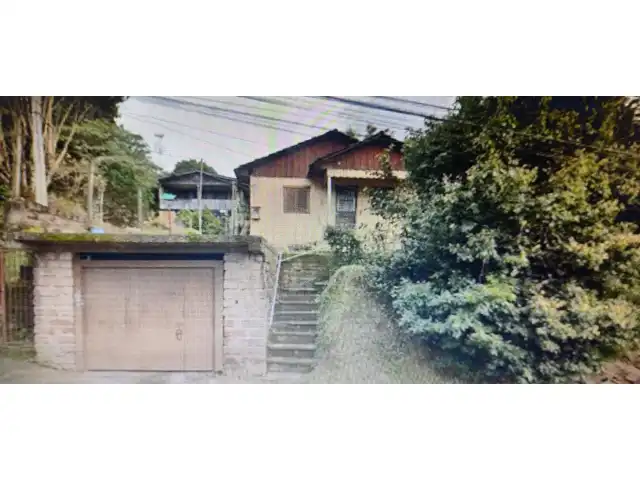01 CASA LOCALIZADA NA RUA VENANCIO AIRES, 711, CANUDOS, NOVO HAMBURGO- RS